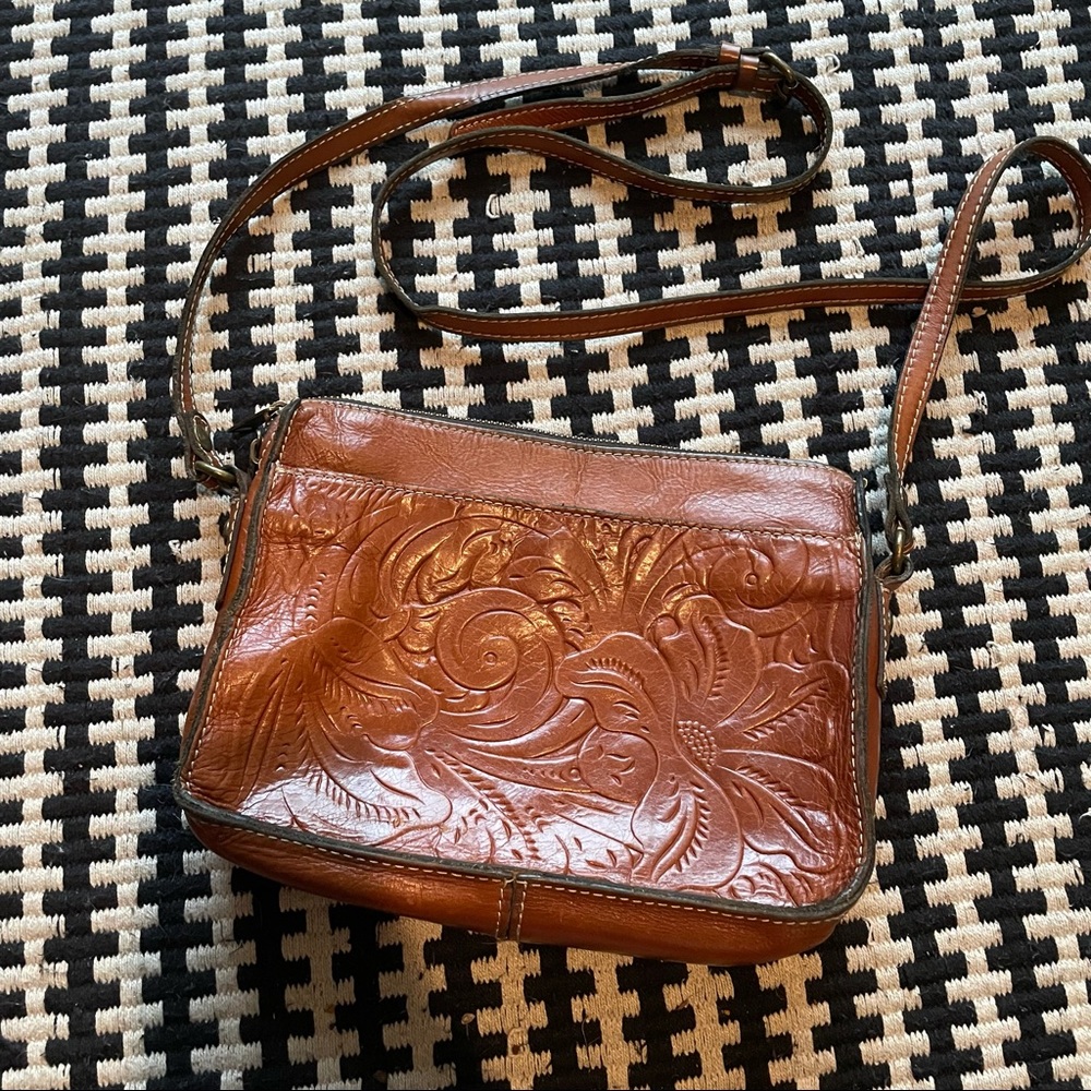 Patricia Nash tooled cross body bag. Gently used